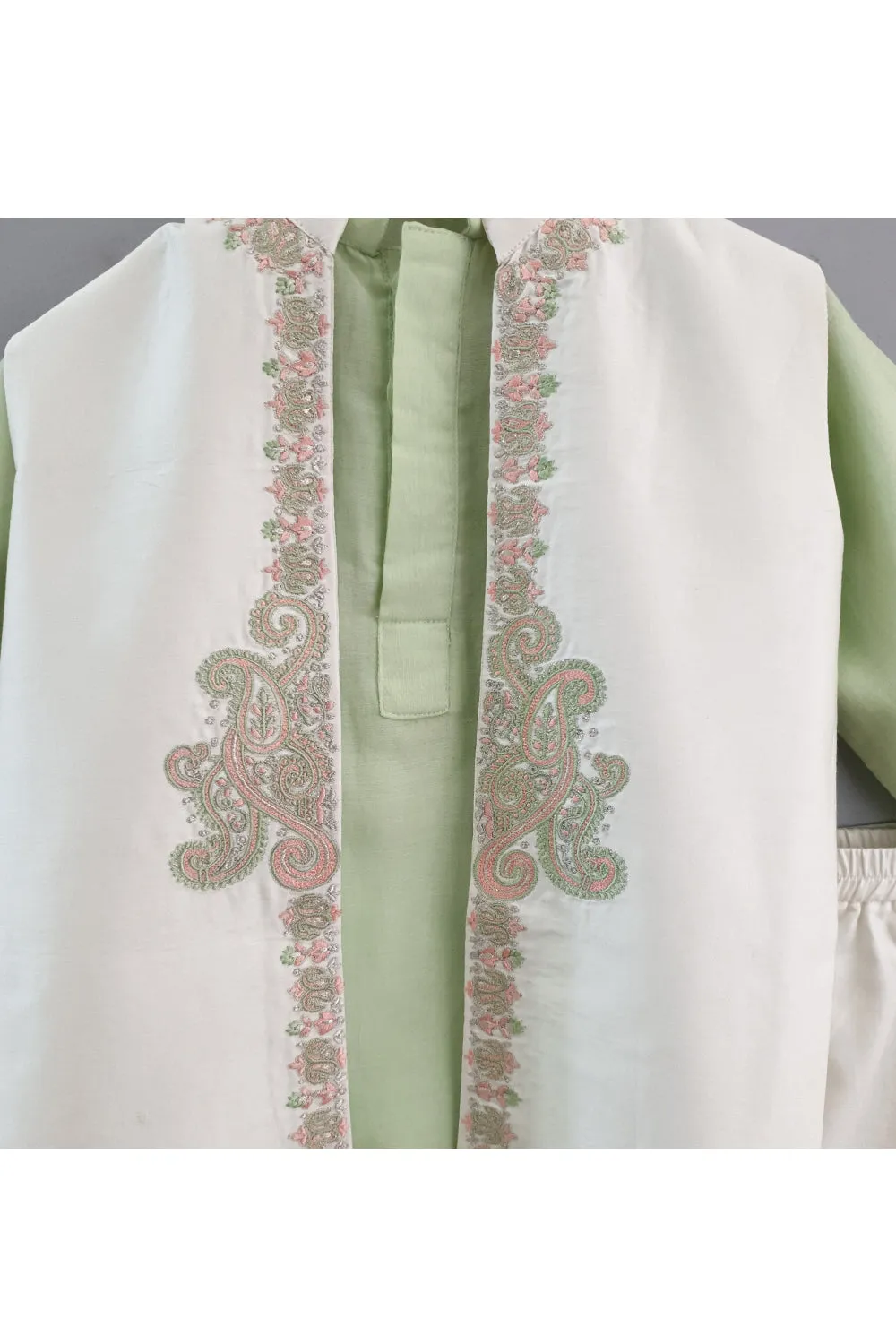 Light green kurta and pyjama with embroidered jacket